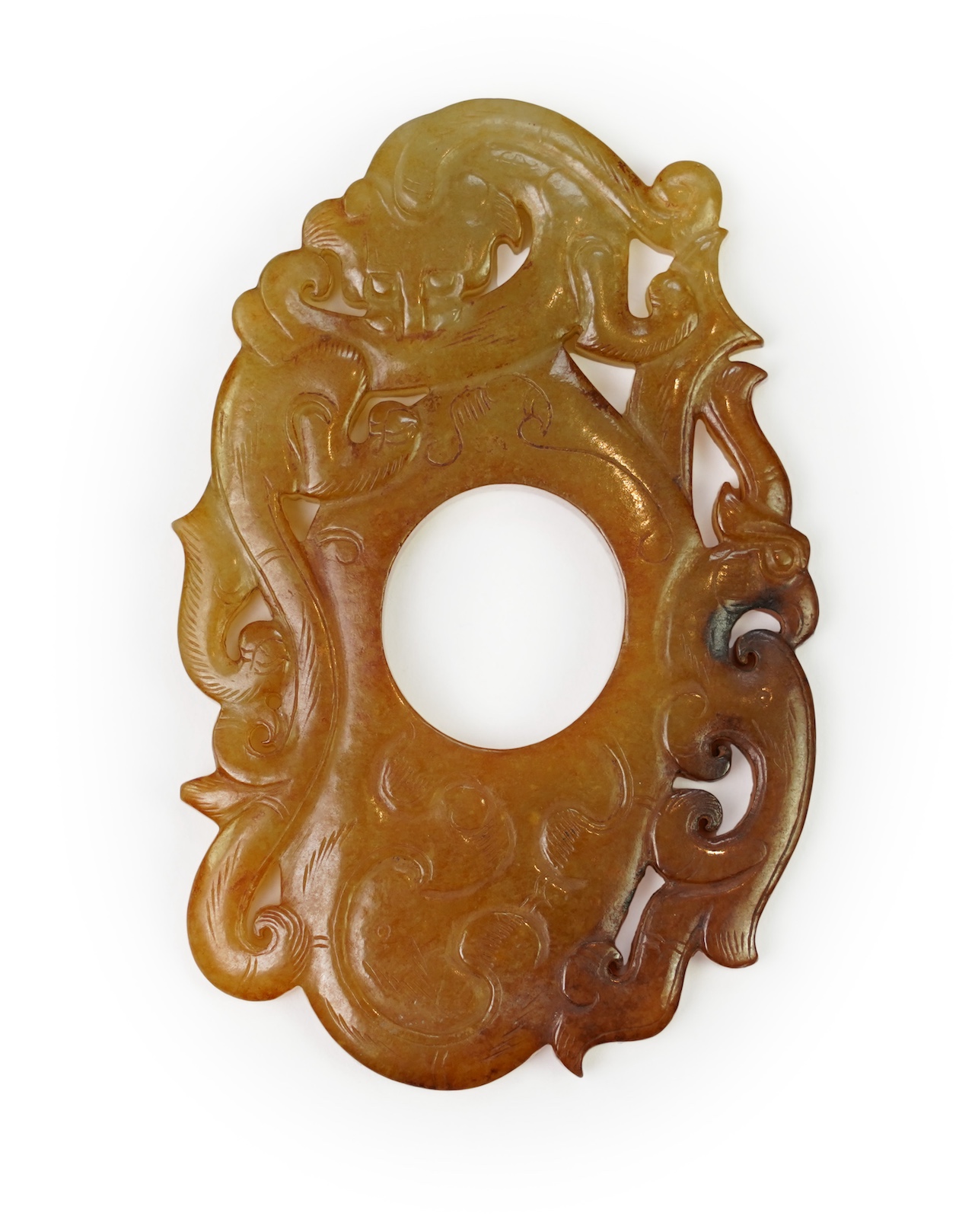 A Chinese archaistic jade plectrum-shaped plaque